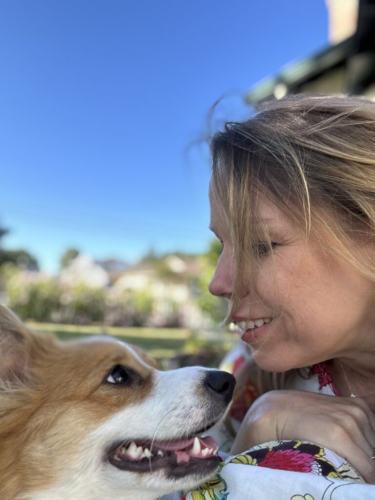 Photo of Daisy and Brandy smiling and looking at each other