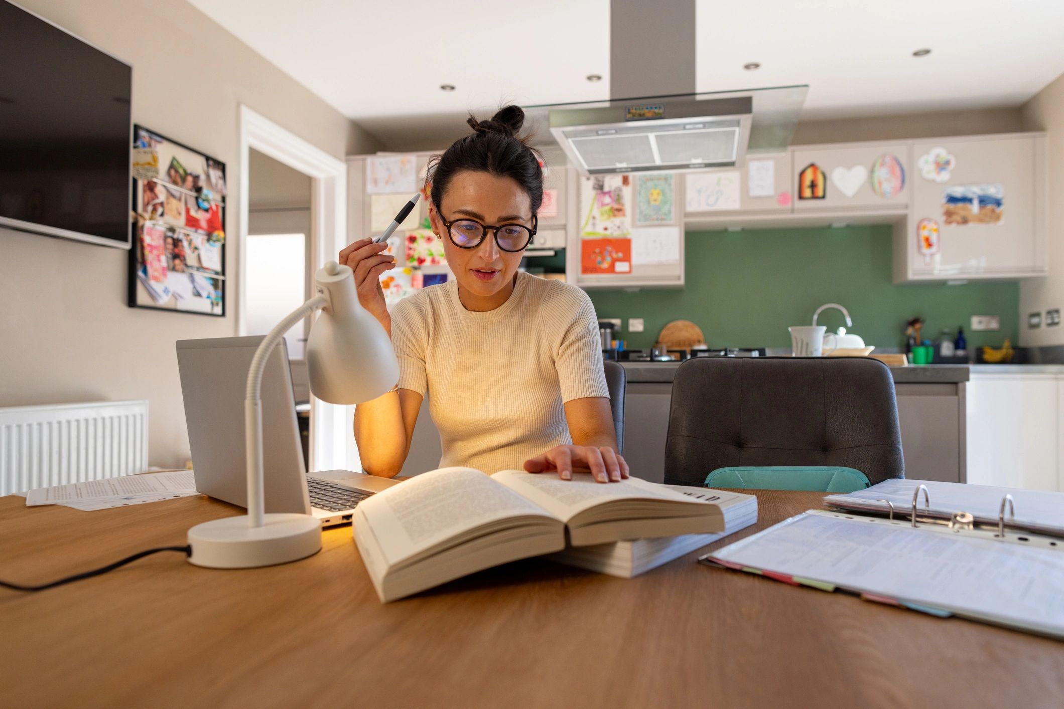 Woman writing at home